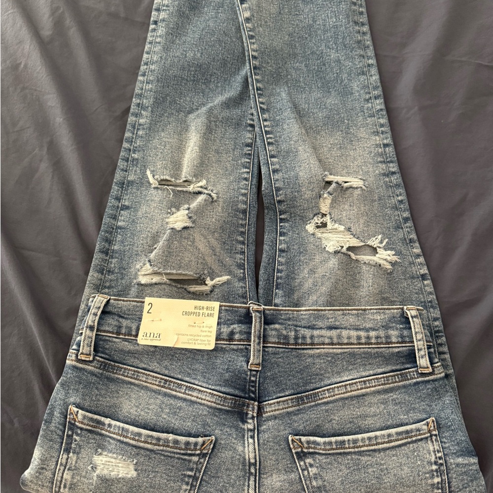 Brand New Ana High Rise Cropped Distressed Flare Jeans in Cosmic Blue